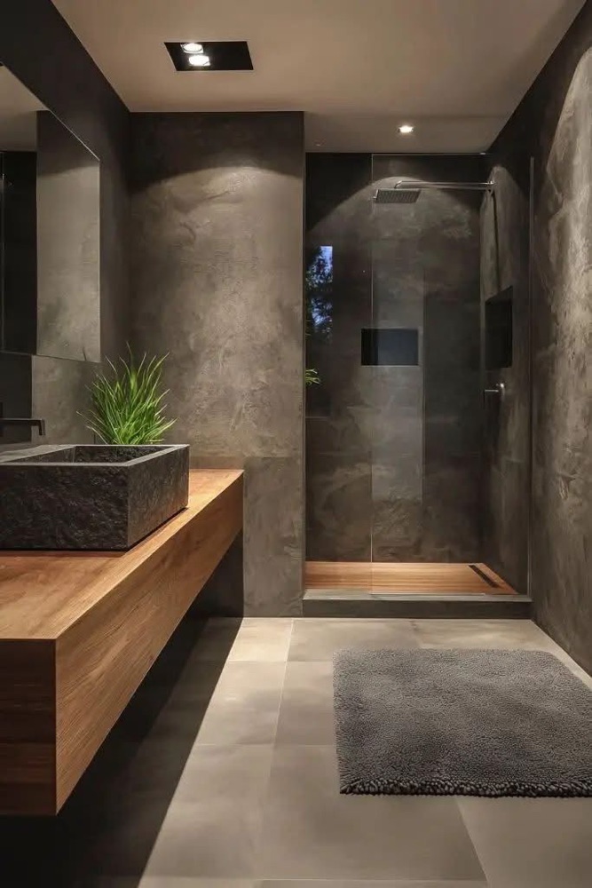 Antraciet badkamer met houten meubel en inloopdouche